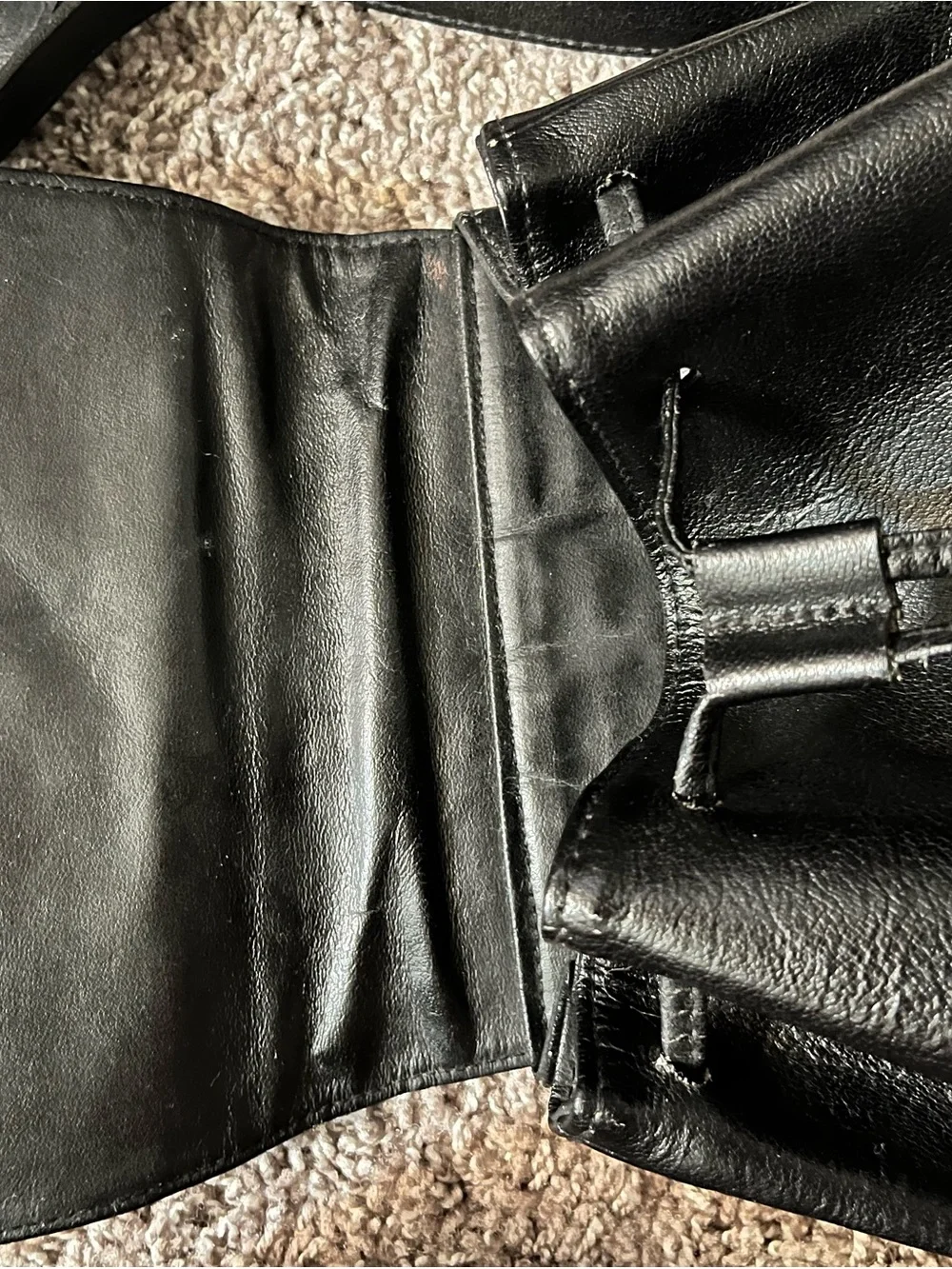 JJs House Black Leather Drawstring Flap Backpack